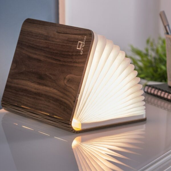 This wooden book lamp opens into a 360° glowing sculpture. Made from walnut and gift-wrapped with care. Order before 15:00 for same-day shipping.