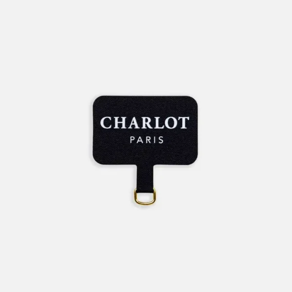 Attach your Charlot Paris strap to your own phone case with this strong phone strap adapter. Subtle, secure, and stylish.