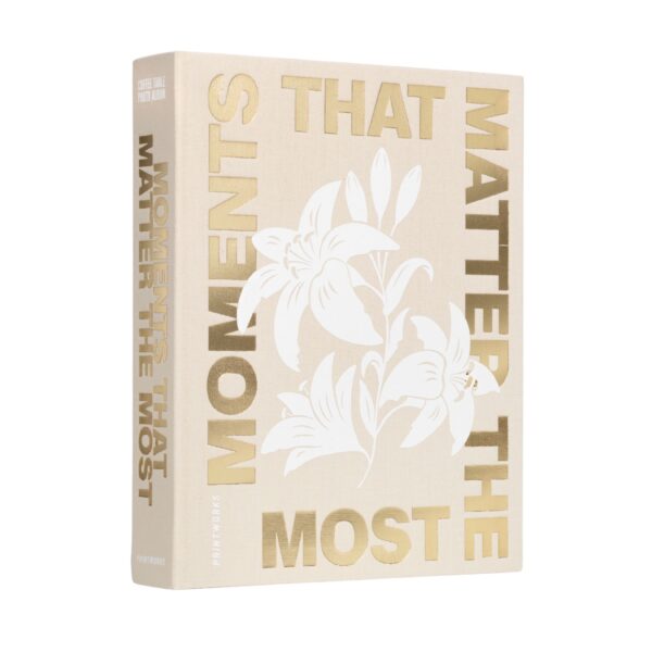 Beige coffee table photo album with gold foil text