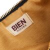 Etui goldfinch petrol bien moves binnenkant en rits afwerking