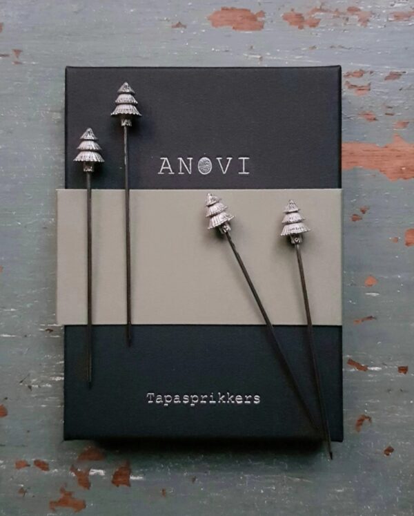 Handcrafted pewter tree tapas sticks by Anovi, set of four in black luxury box with green sleeve, festive Christmas table.
