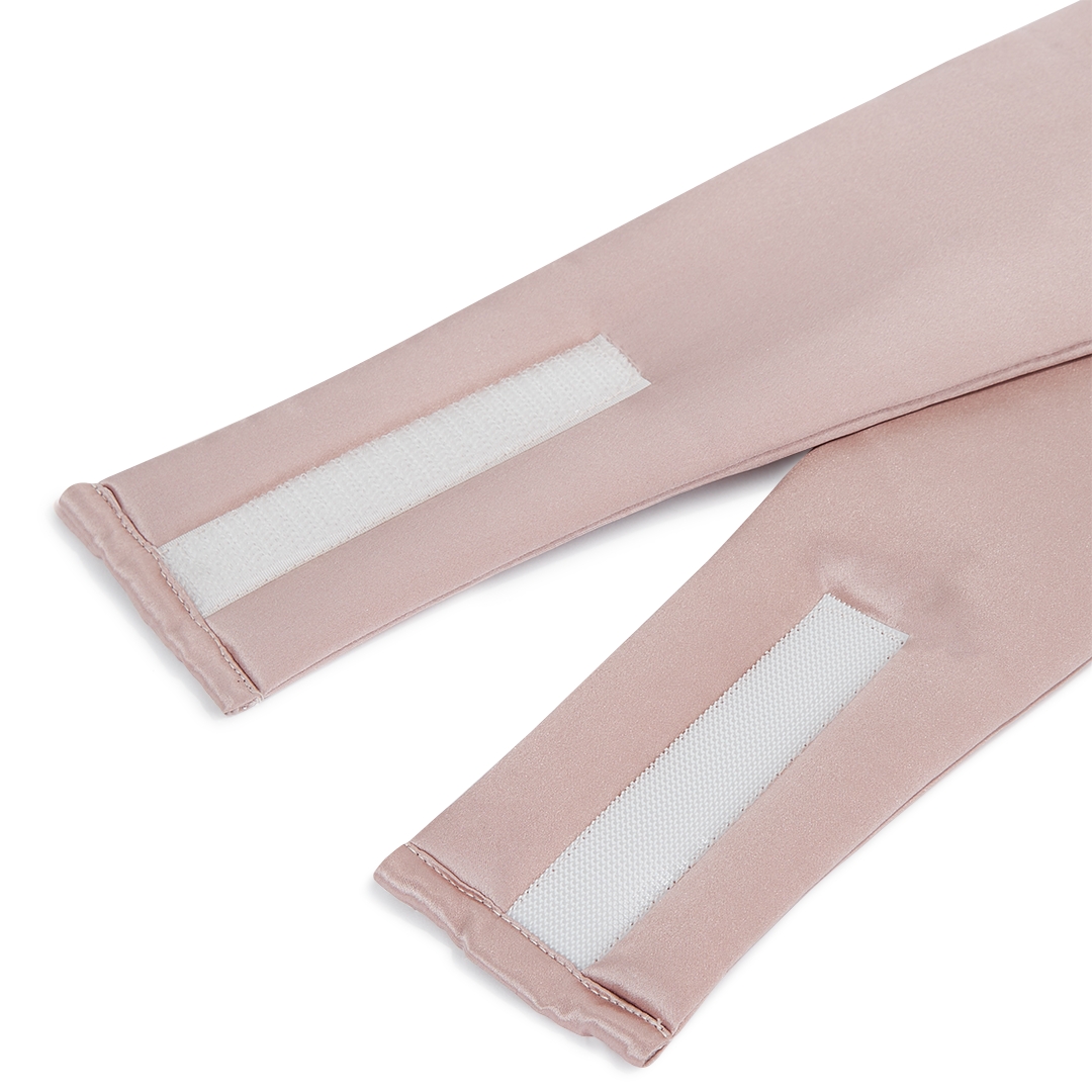 Dark pink silk sleep mask by Dore & Rose in the Rêve Éveillé shade.