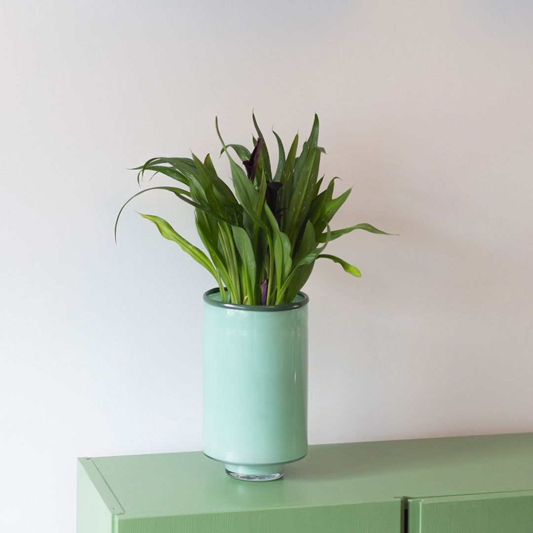 Pistachio green vase 26cm from the Milo collection. Modern glass design, perfect for fresh flowers or as a sculptural interior accent.
