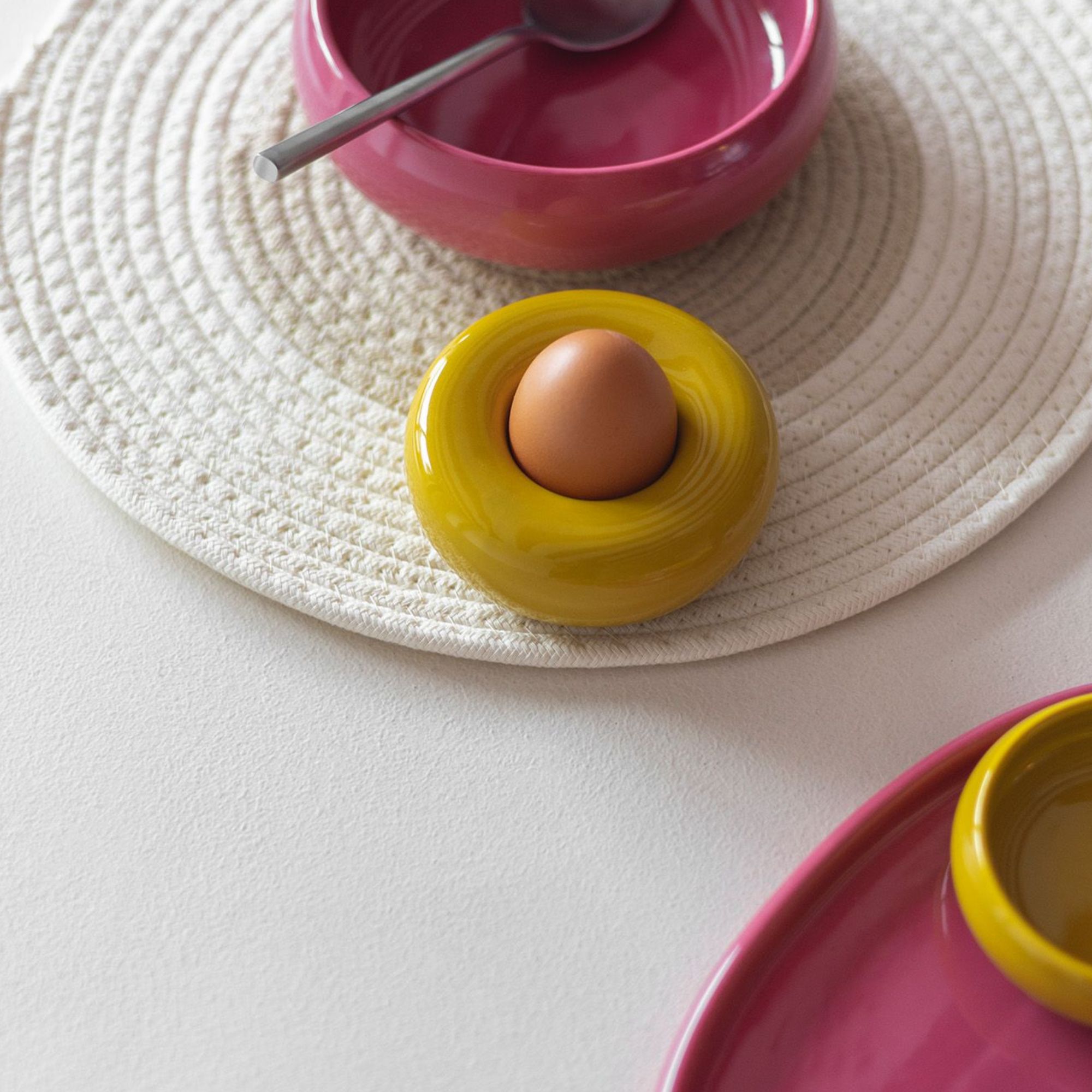 Mustard yellow stoneware egg cups from the Billie collection, set of two with glossy finish