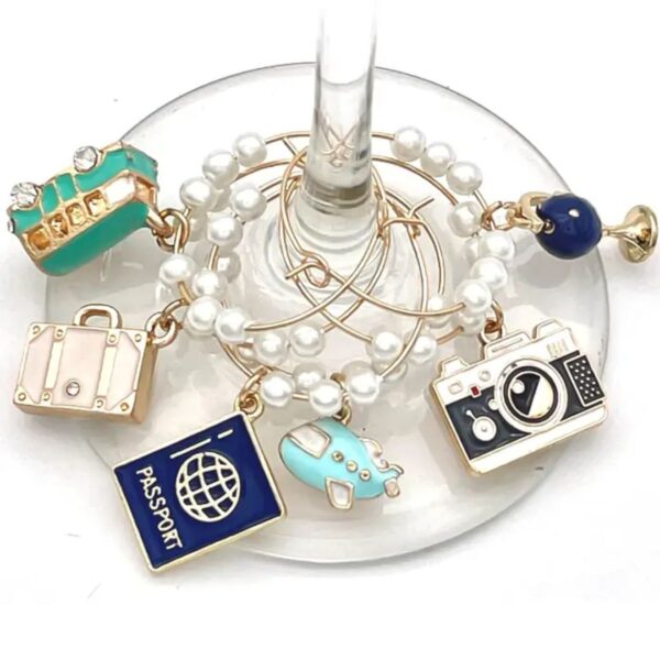 travel wine charms set with globe suitcase airplane passport and camera designs