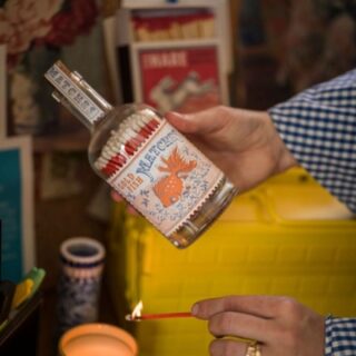Goldfish Stamp Matches Bottle - Archivist