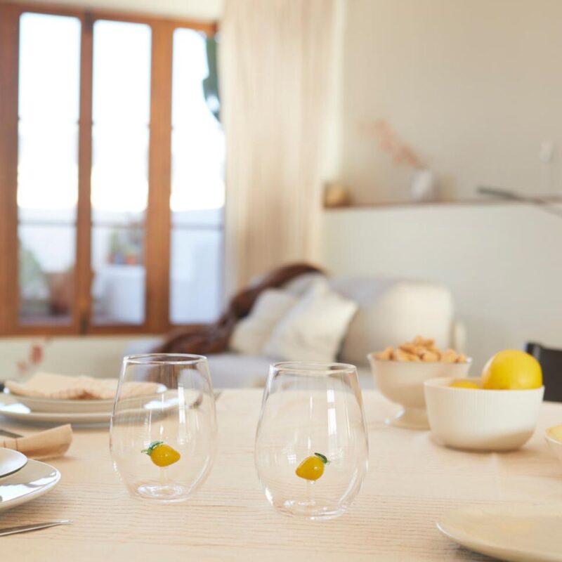 Lemon glass set of 2 handcrafted borosilicate glasses by Balvi. A playful citrus design that pairs perfectly with the matching lemon bottle.