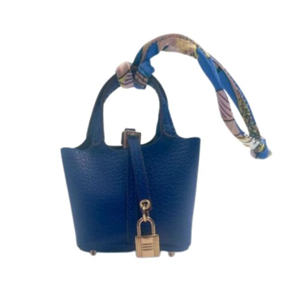 blue bag charm luxury handbag detail