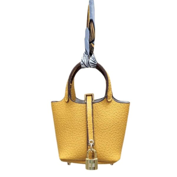 yellow bag charm luxury handbag detail