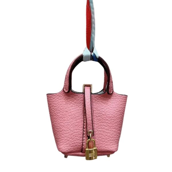 pink bag charm luxury handbag detail