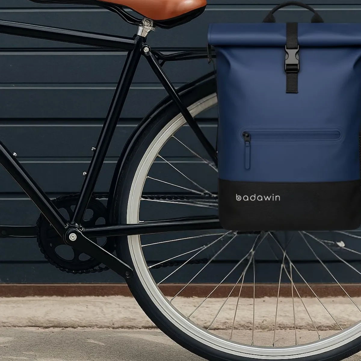 Blue bicycle pannier with hidden luggage rack attachments